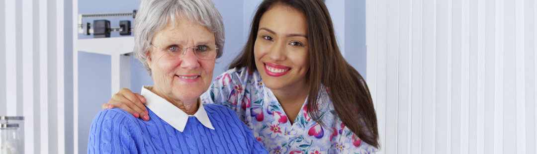 female caregiver with senior woman